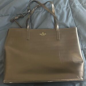 Kate Spade tote with tassel.  Good condition.